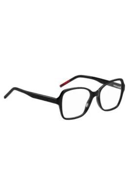 Montura para gafas graduadas de acetato negro con detalles de la marca en las patillas