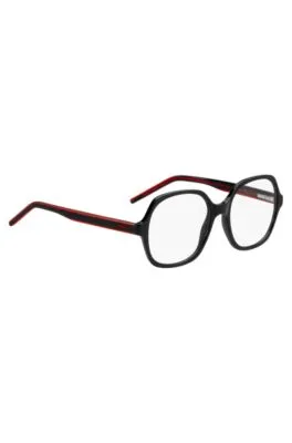 Montura para gafas graduadas de acetato negro con patillas a capas en el rojo de la marca