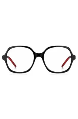 Montura para gafas graduadas de acetato negro con patillas a capas en el rojo de la marca