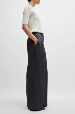 Pantalones relaxed fit en lana virgen con efecto denim