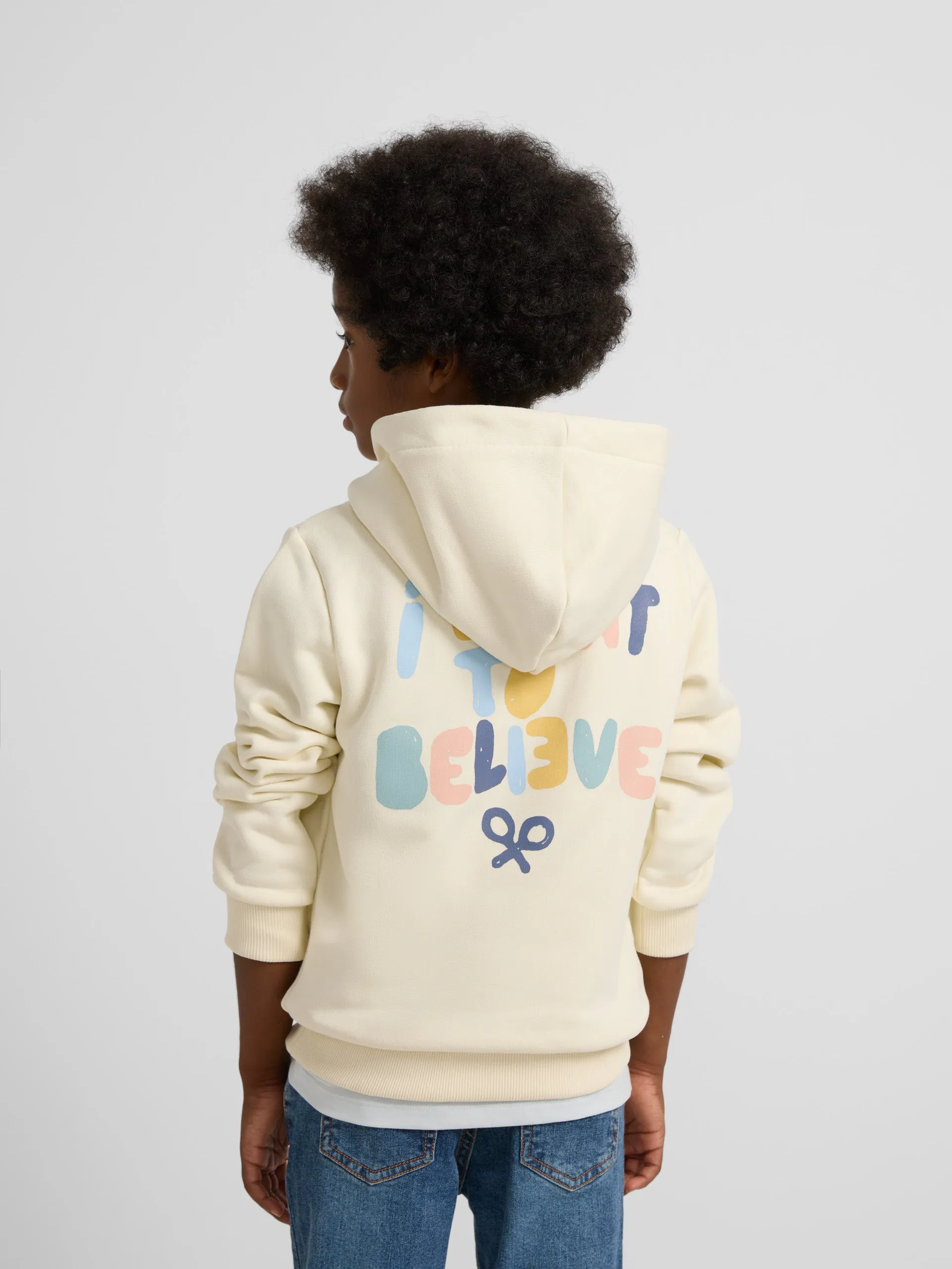 Sudadera kids capucha believe crema