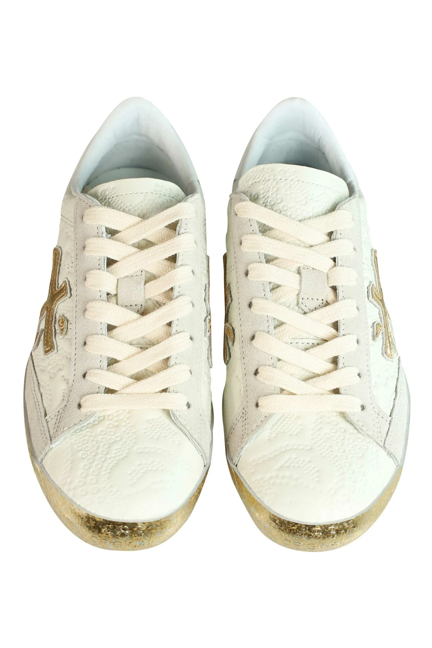 Zapatillas beige con textura y dorado 